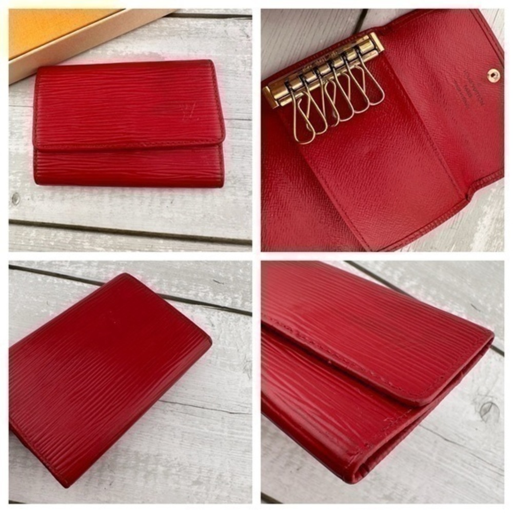 AUTHENTIC Louis Vuitton key holder. Previously owned. Red.